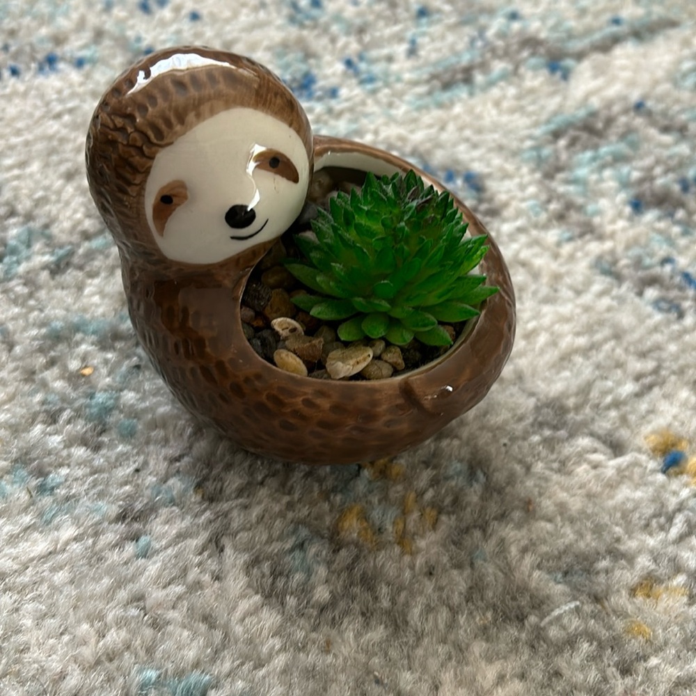 Cute sloth fake plant